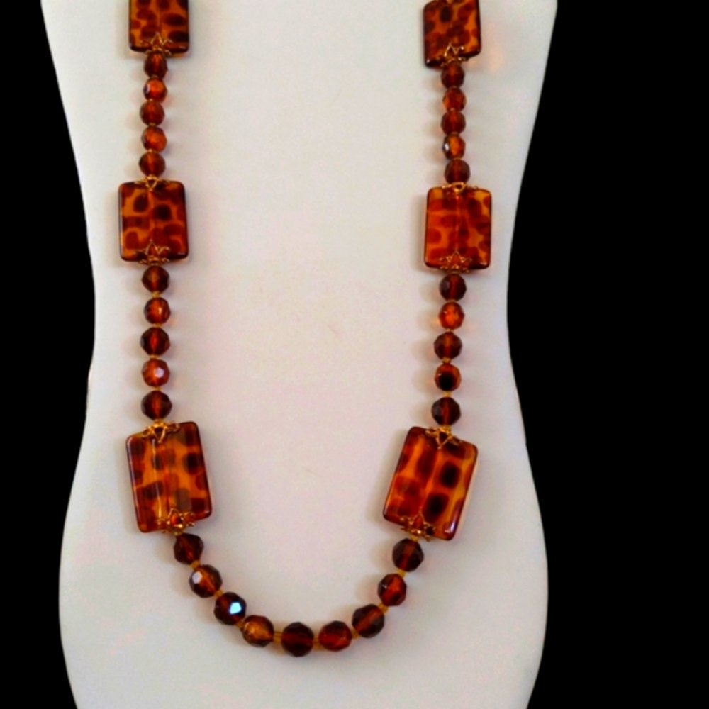 Joan Rivers long faux tortoise bead necklace